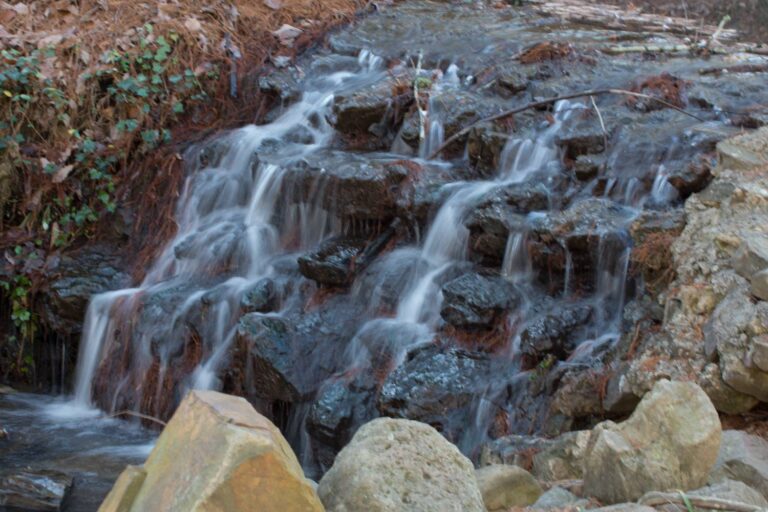 Small waterfall cascading over rocks on the Berry College lands near Rome