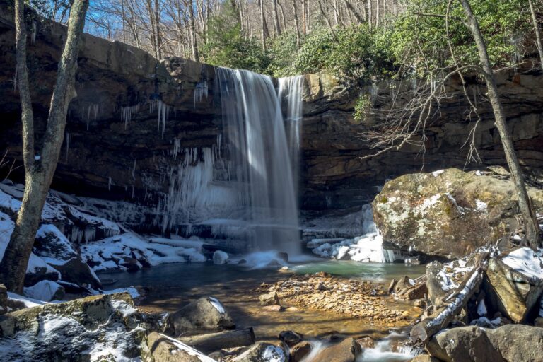 Cucumber Falls spilling over a rock ledge in Ohiopyle State Park