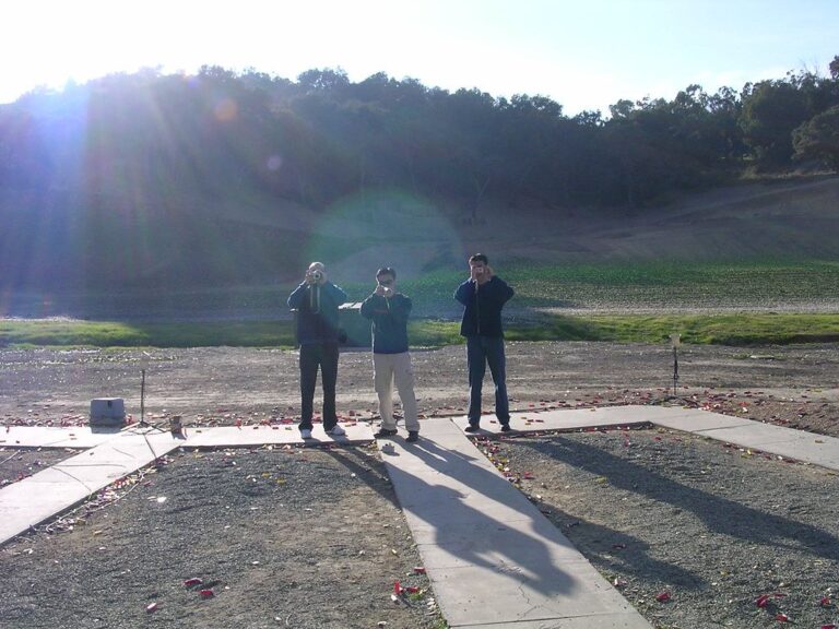 Trap shooters on a shotgun field